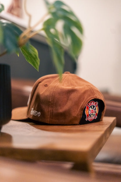 Fire Rescue Kap-Bak on brown cap - detail shot