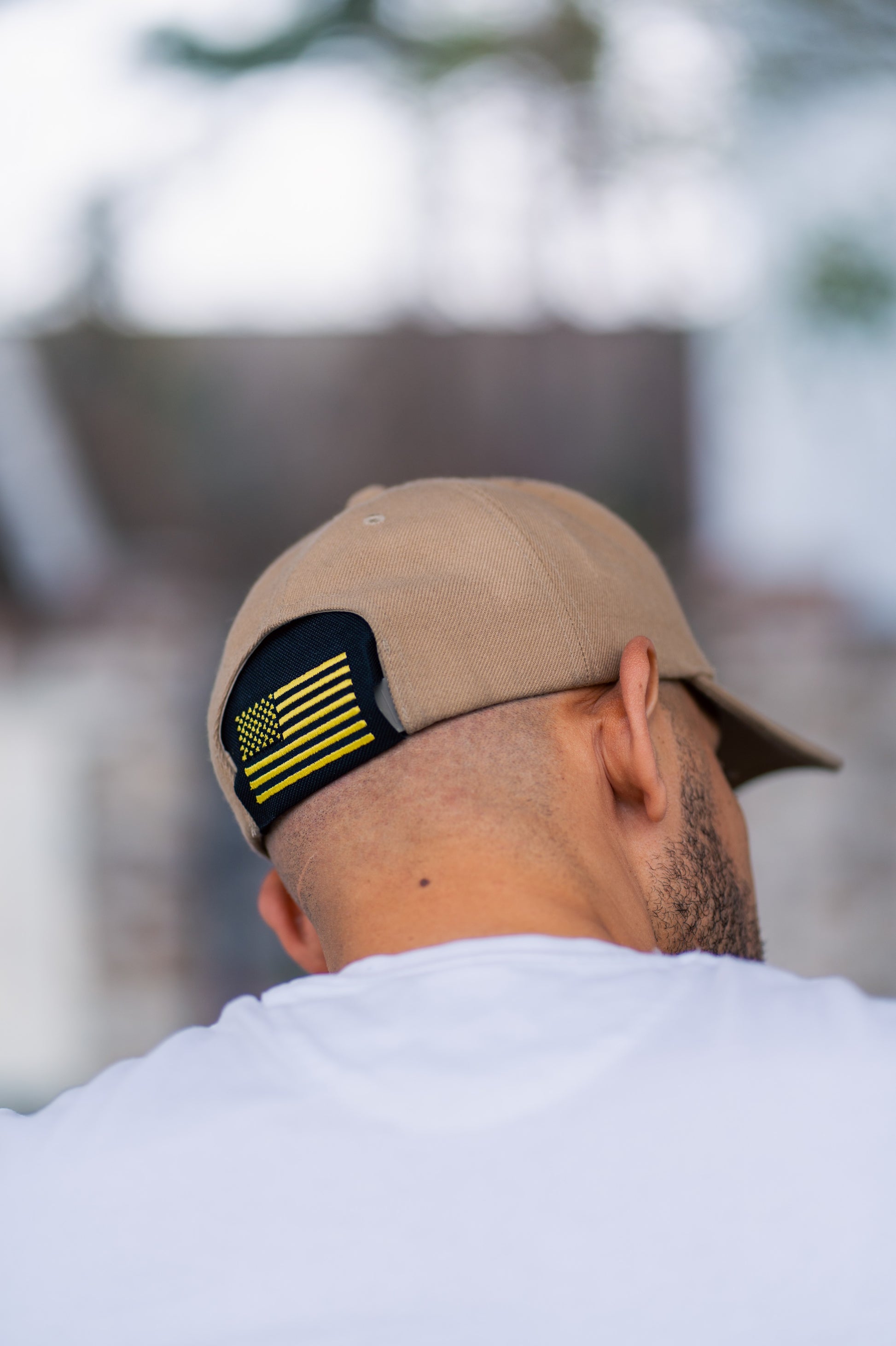 American Flag Kap-Bak - back of head white tee