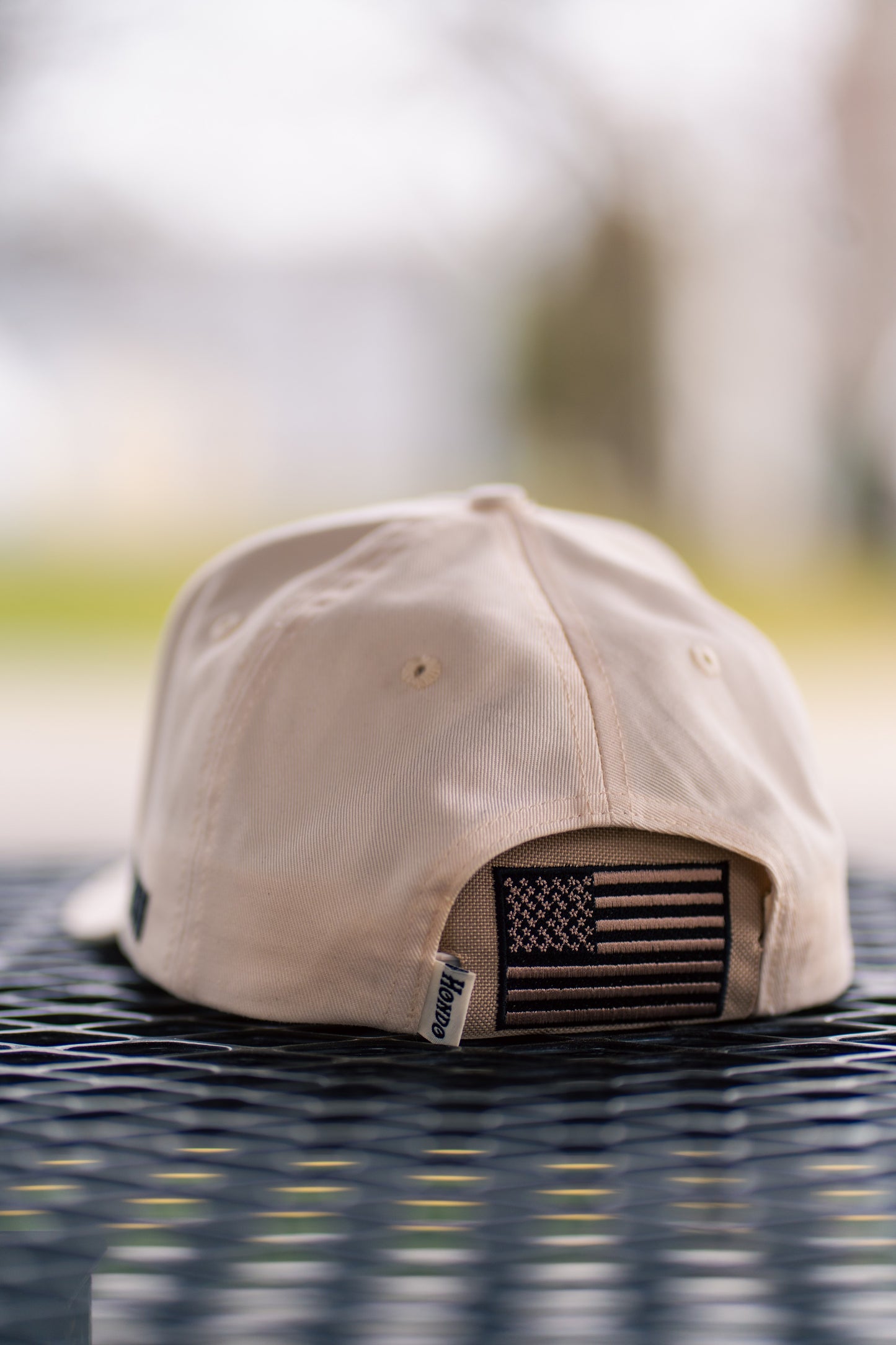 American Flag Kap-Bak on cap - bench front view